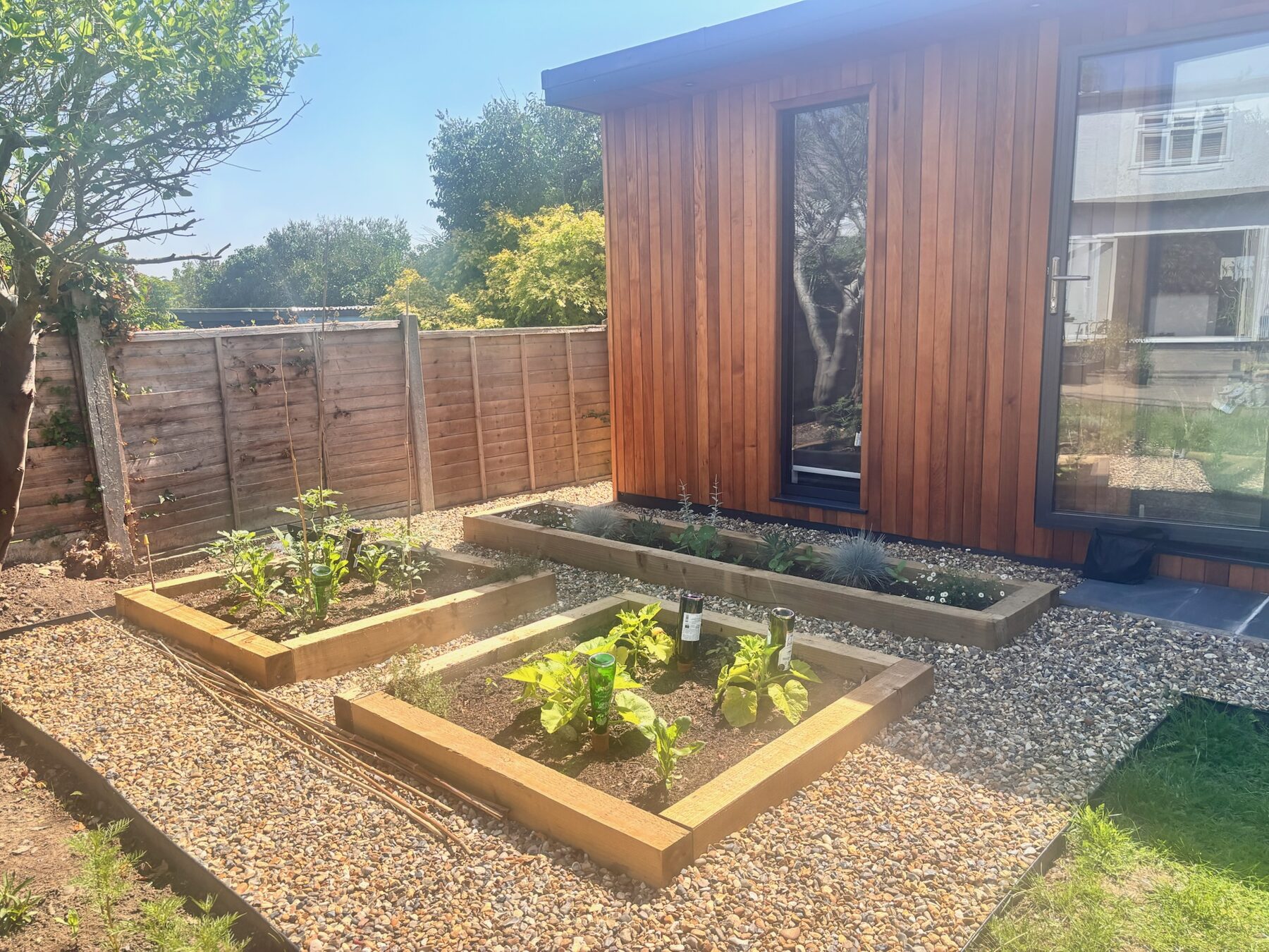 Finished garden room landscape photo 11